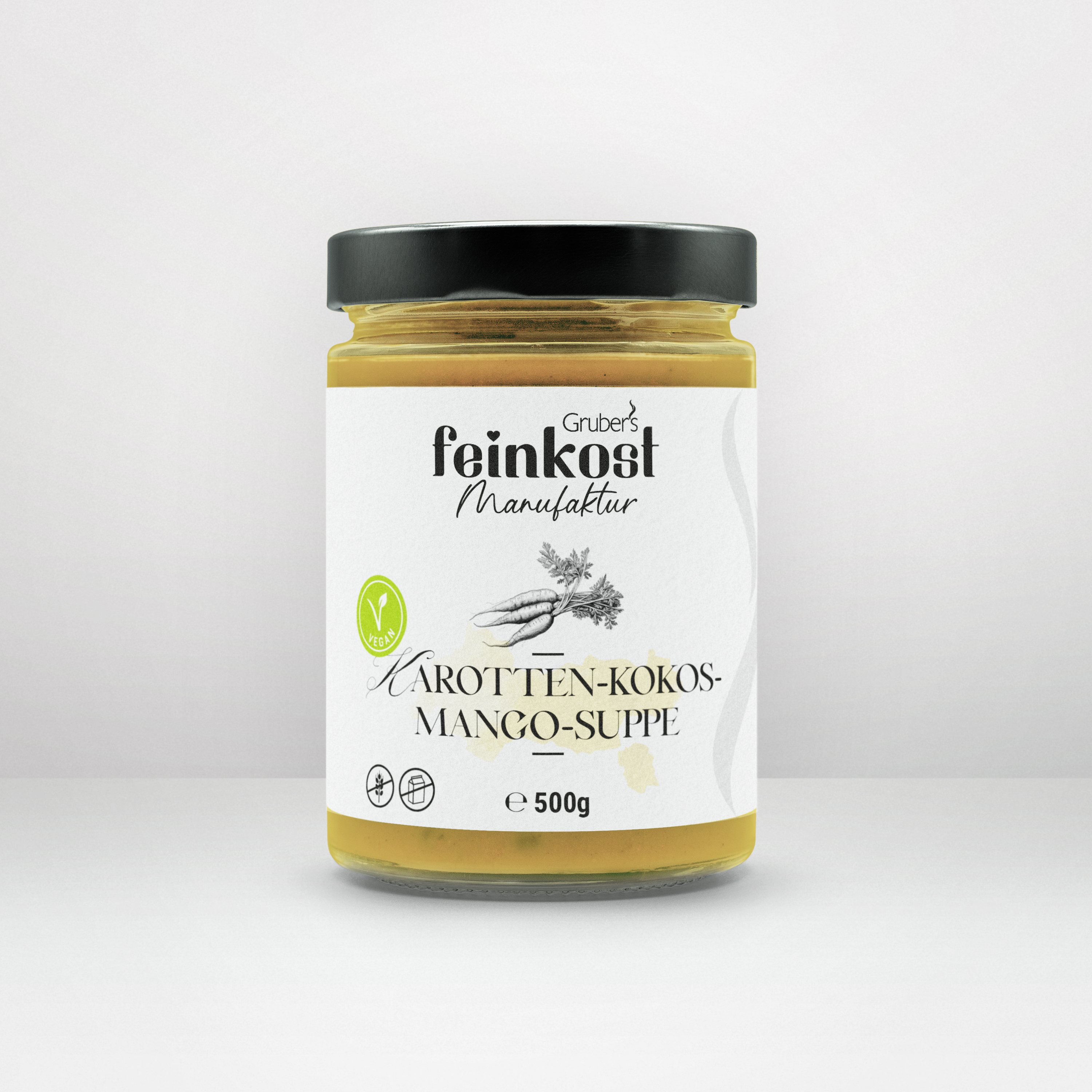Glas mit 500 g Karotten-Kokos-Mango-Suppe von Gruber's Feinkost, cremige Suppe mit exotischer Fruchtnote.
