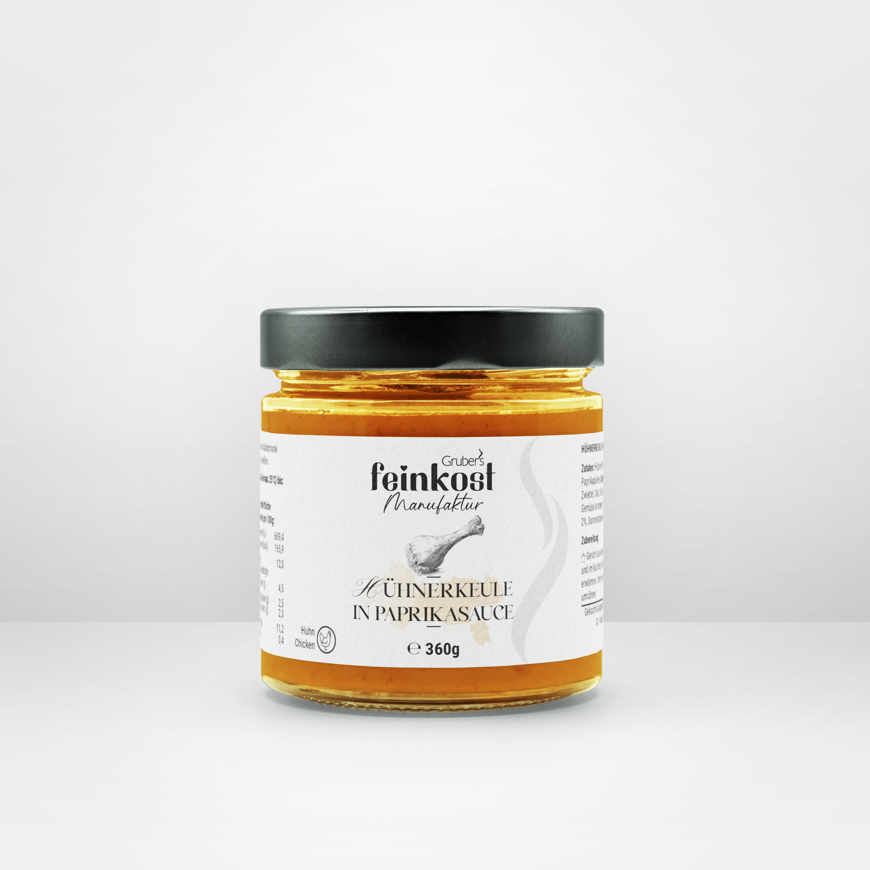 Glas mit Hühnerkeule in Paprikasauce von Gruber’s Feinkost, 360g.