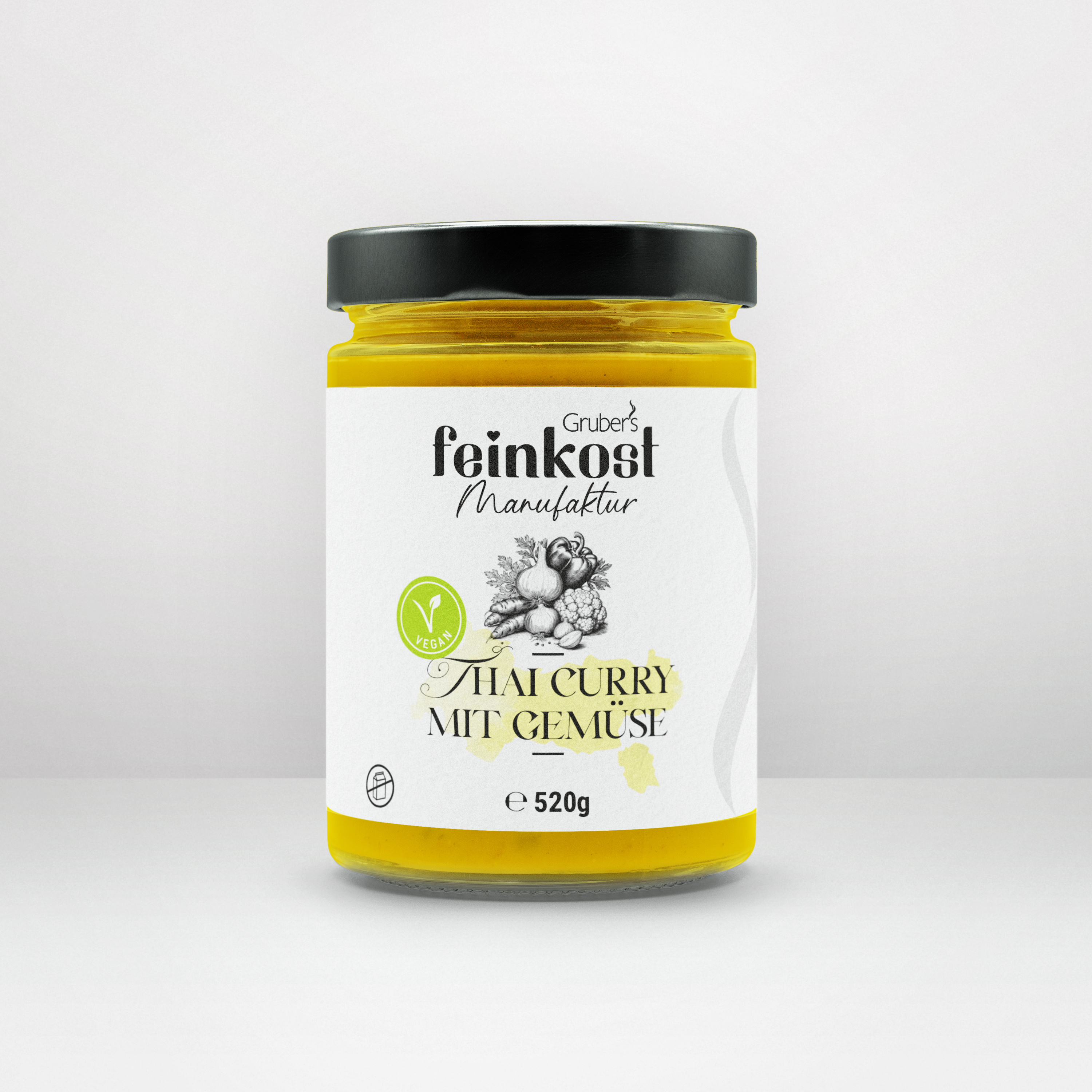 Glas mit Thai-Curry mit Gemüse (520 g) von Gruber’s Feinkost, hochwertig verpackt mit Etikett.