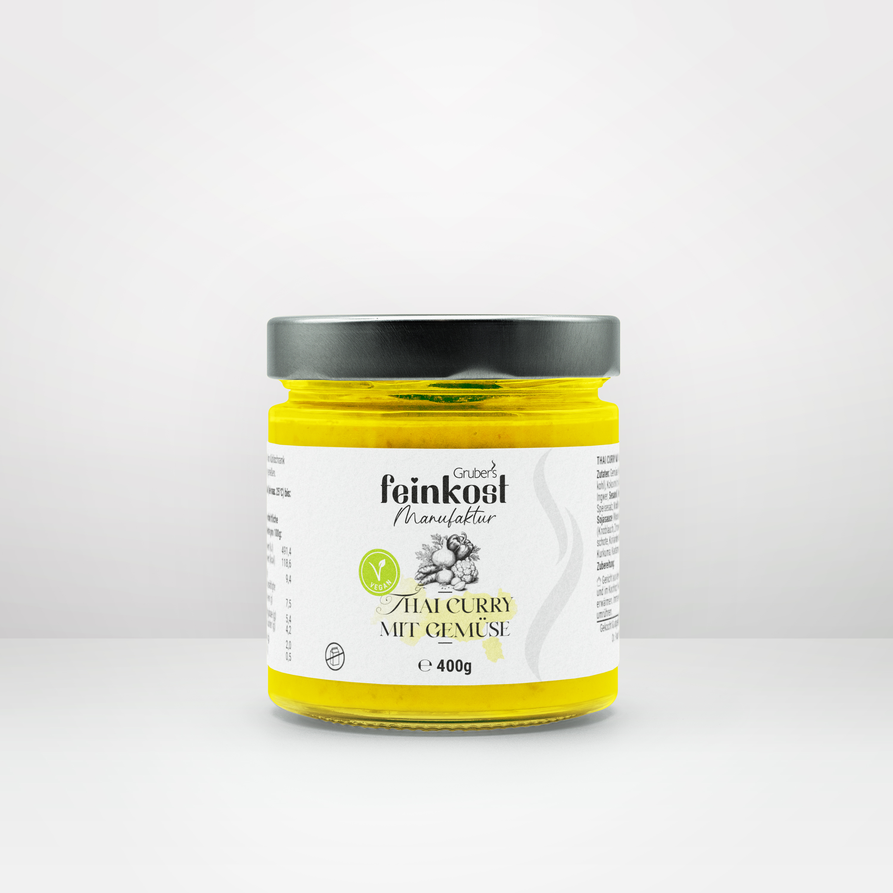 Glas mit Thai-Curry mit Gemüse (400 g) von Gruber’s Feinkost, hochwertig verpackt mit Etikett.