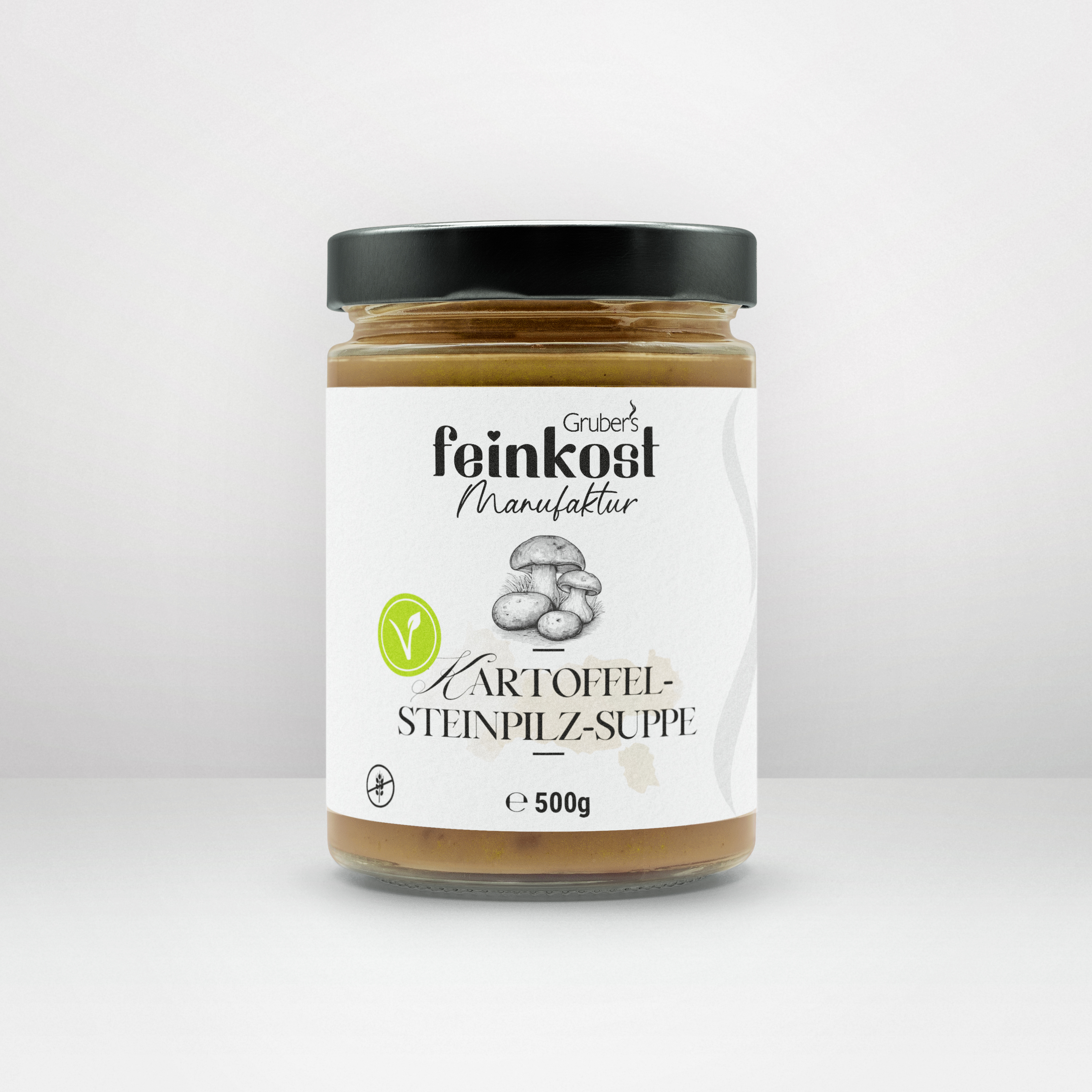 Kartoffel-Steinpilz-Suppe von Gruber's Feinkost in einem Glas, eine cremige Suppe mit feinem Steinpilzaroma.